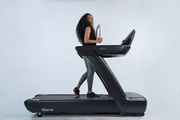Patient performing cardiac stress test on treadmill